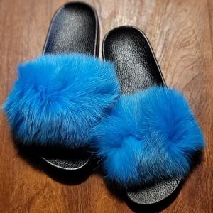 Turquoise blue fox fur slides